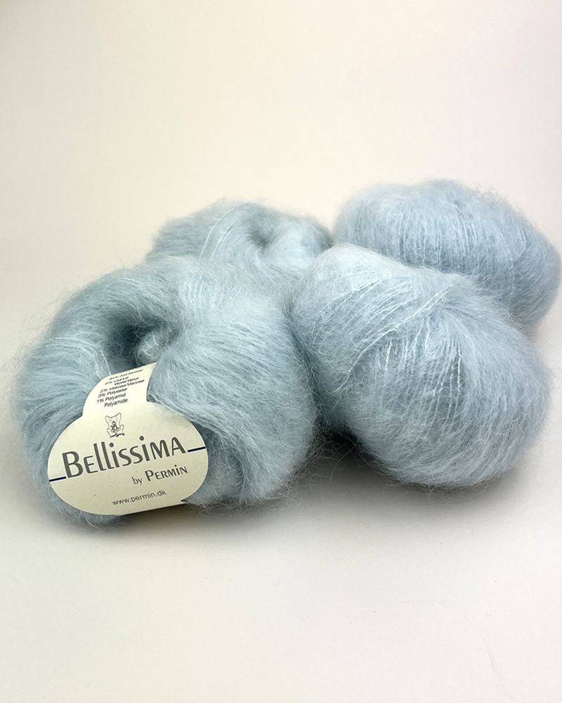 Kort cardigan med hullstrikk. Garnpakke